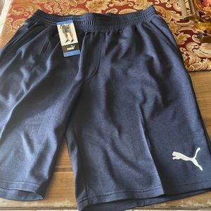 Puma men’s athletic shorts.  New with tags!